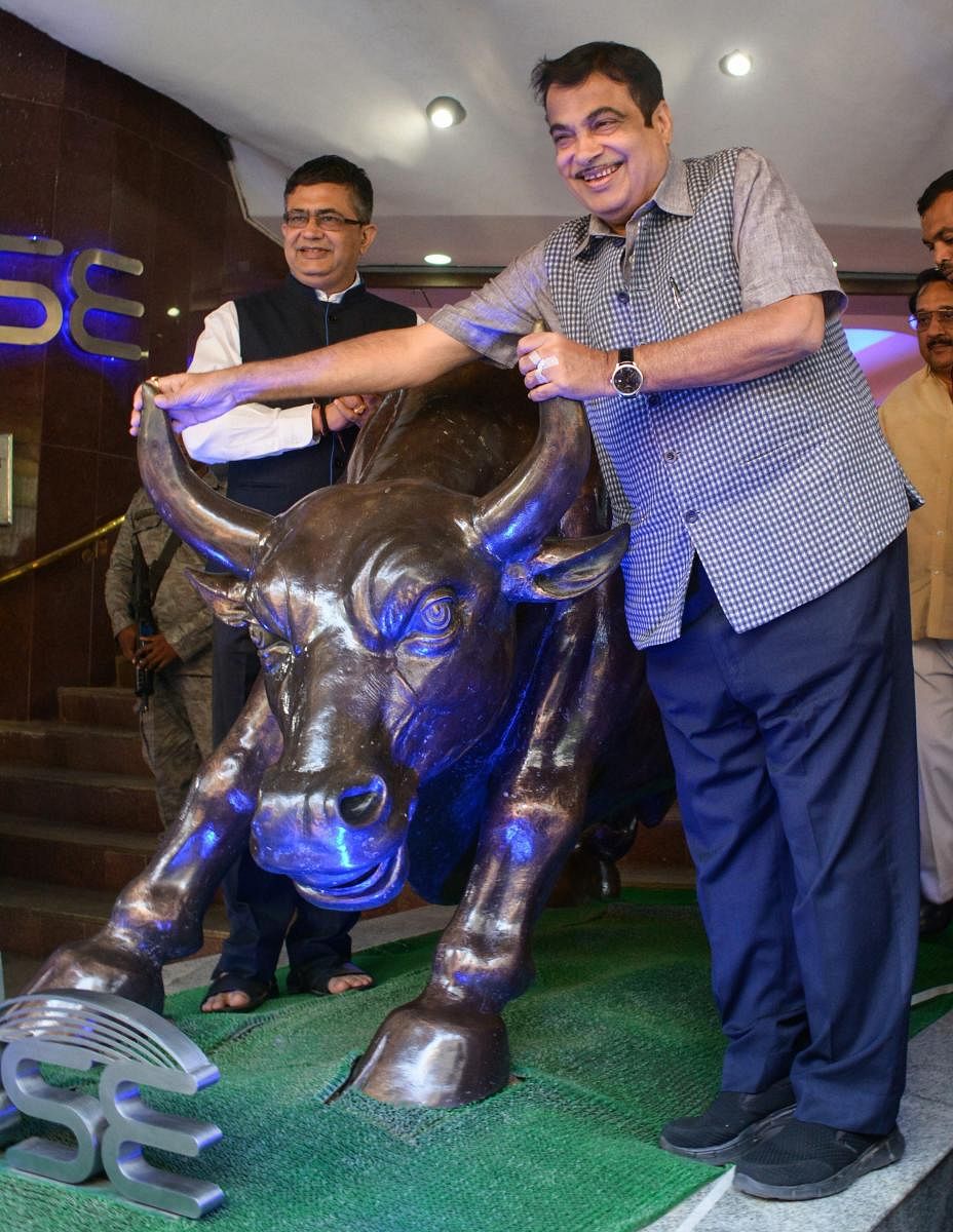Union Minister of Road Transport and Highways Nitin Gadkari with BSE President Ashish Kumar Chauhan at Bombay Stock Exchange (BSE), in Mumbai, on Saturday. PTI Photo