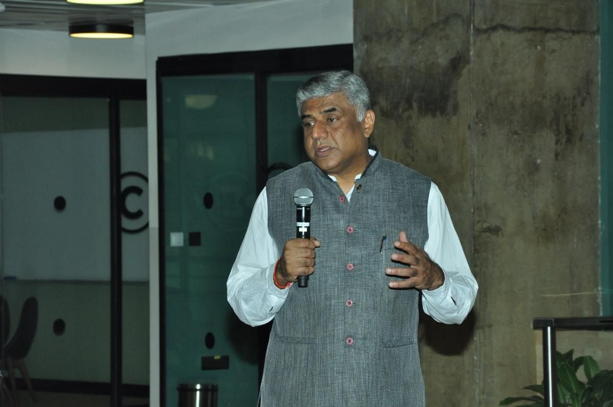 Rajya Sabha member Rajeev Gowda speaks at a consultation meeting with startups organised by the Congress party in Bengaluru on Sunday. dh photo