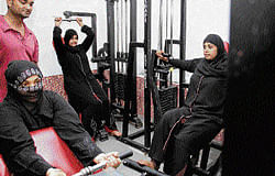 Burqa-clad women work out at a gym in Ahmedabad. Hanif Sindhi