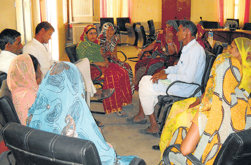 Panchayat members in discussion at  Etava in Rajasthan.