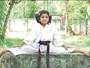 Varsha Vinod displays her flexible body developed through Karate practice.