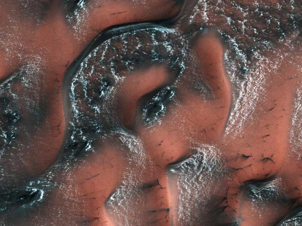 From studying rock formations from satellite images, scientists know that hundreds of craters across the surface of Mars were once filled with water. (Image: NASA)