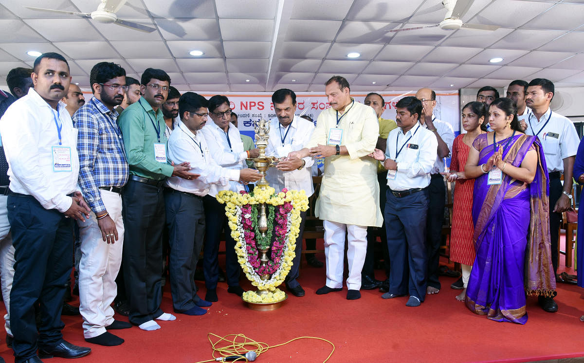MLCs Ivan D'Souza, Ayanur Manjunath and S L Bhoje Gowda inaugurate the NPS Employees district convention and 12th executive committee meeting in Mangaluru on Sunday.