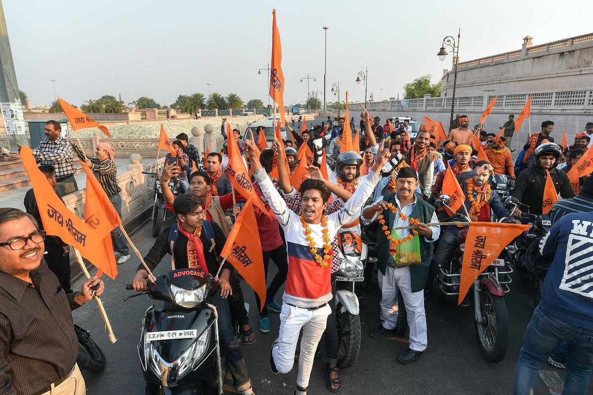 VHP volunteers stage a motor bike rally in Lucknow to make a call for their November 25 Vishal Dharm Sabha at Ayodhya. PTI