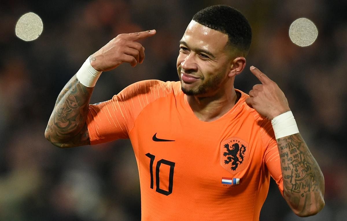 The Netherlands' Memphis Depay celebrates after scoring against France during their UEFA Nations League game on Friday. AFP