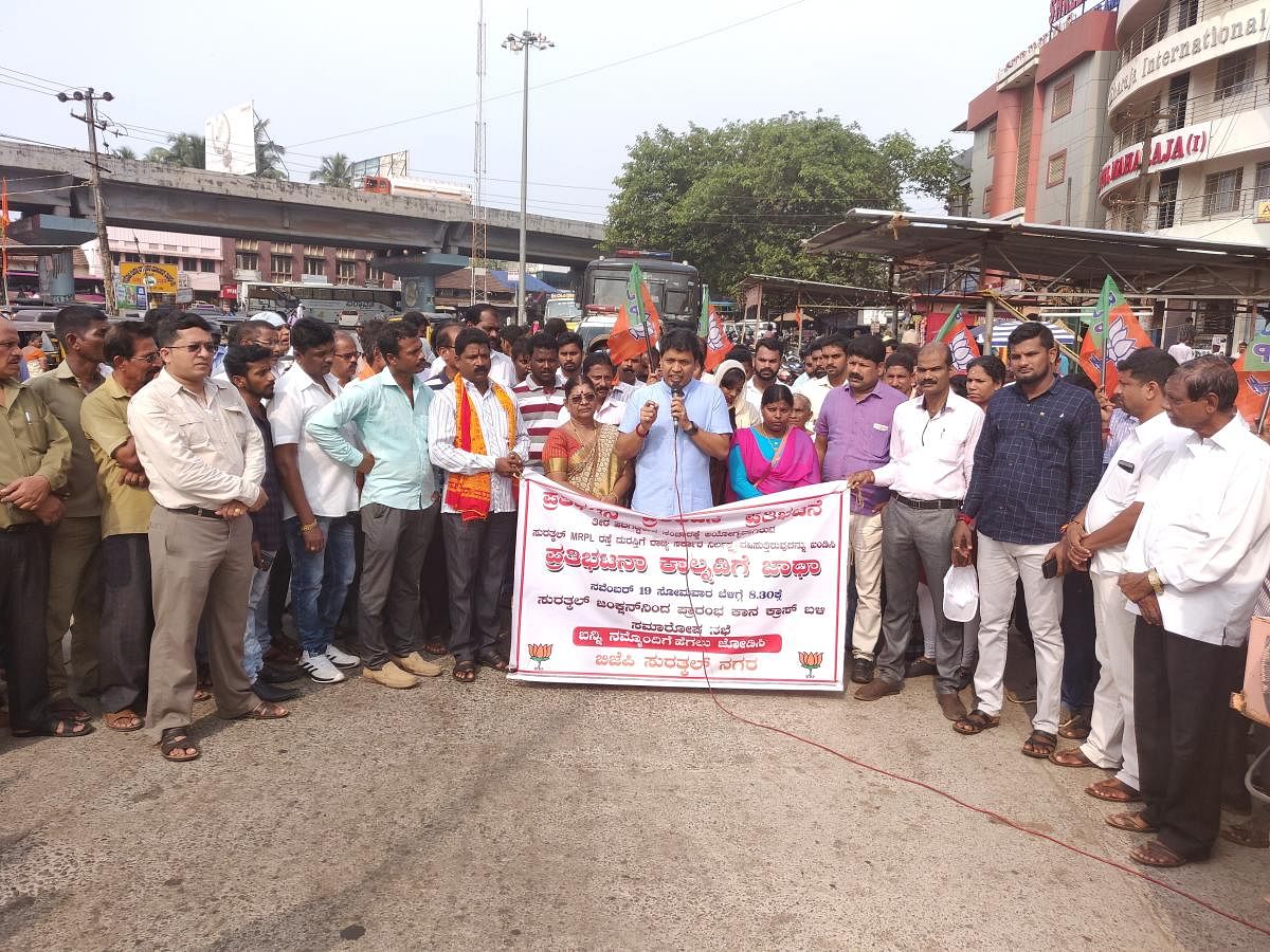 Mangaluru City North MLA Dr Y Bharath Shetty addresses protesters in Surathkal.