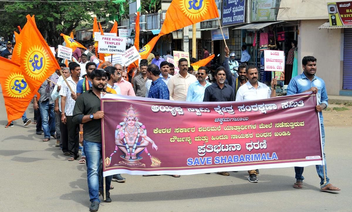 Ayyappa Swamy Kshethra Rakshana Samithi members take out a procession in Chikkamagaluru on Tuesday.