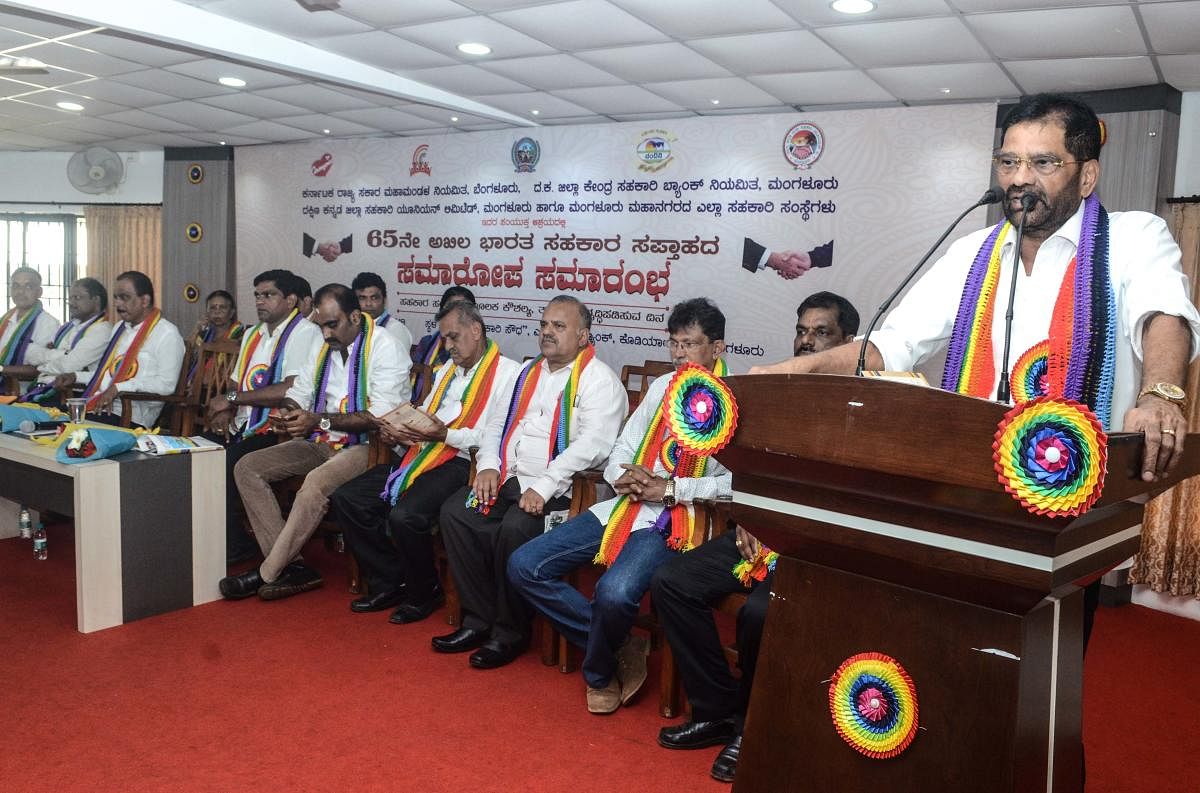 SCDCC Bank Chairman M N Rajendra Kumar speaks at the valedictory of All India Cooperative Week in Mangaluru on Tuesday.