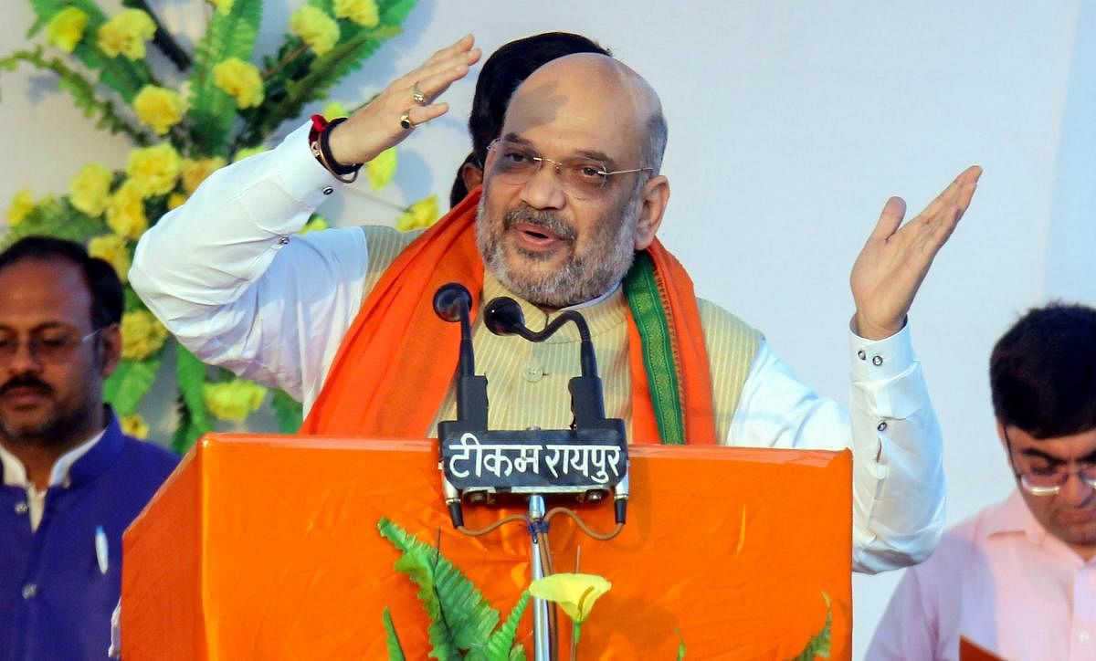 BJP president Amit Shah and Congress president Rahul Gandhi will be addressing rallies on Tuesday. PTI file photo.