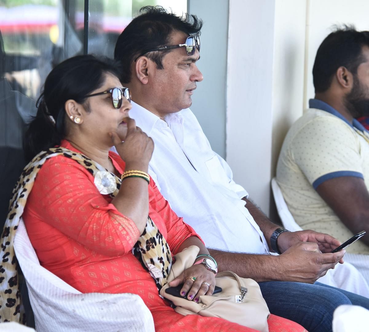 HAPPY DUO: Parents Gajanan More and Sarita More watched their son Ronit bag a crucial five-wicket haul for Karnataka against Mumbai in a Group A Ranji Trophy match in Belagavi on Thursday. DH PHOTO/Tajuddin Azad  ಪಂದ್ಯ ವೀಕ್ಷಿಸ