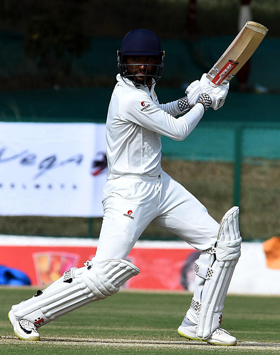 K V Siddharth en route to his unbeaten 71 in the Ranji Trophy game against Mumbai on Friday. DH PHOTO/ Tajuddin Azad