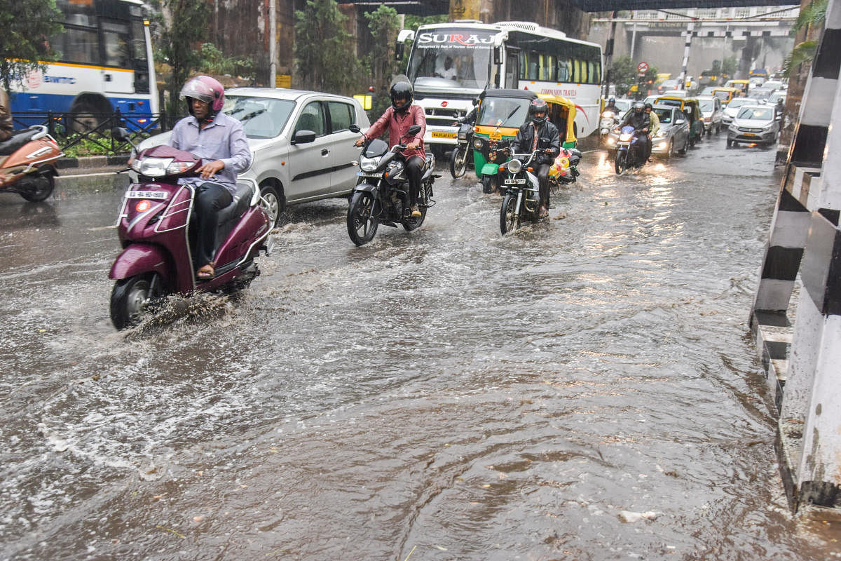 Rainwater stagnated on Ballari Road on Friday. DH Photo/S K Dinesh