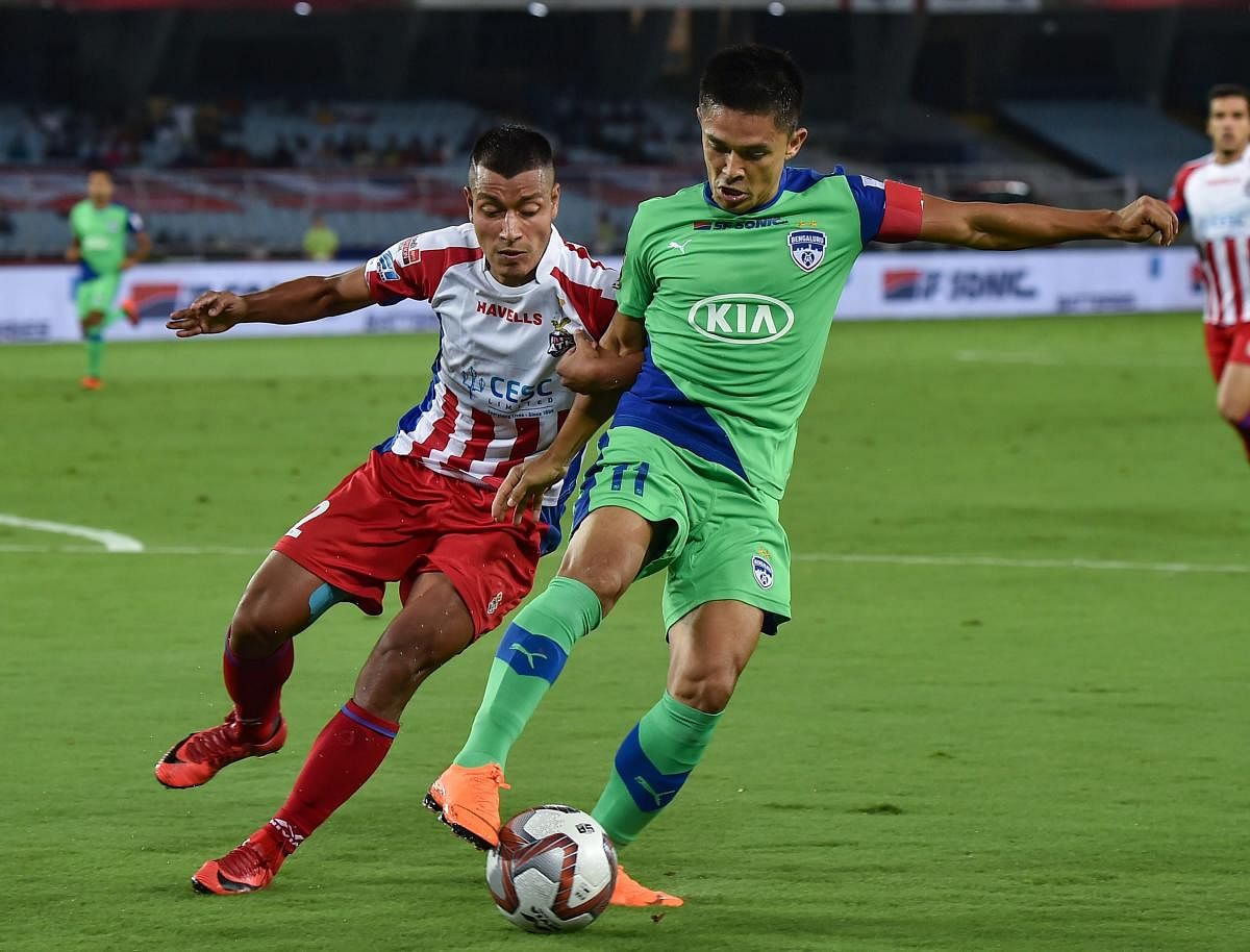 All eyes will be on Bengaluru FC captain Sunil Chhetri when he makes his 150th appearance for the club against bottom-placed Delhi Dynamos in the Indian Super League on Monday. PTI file photo