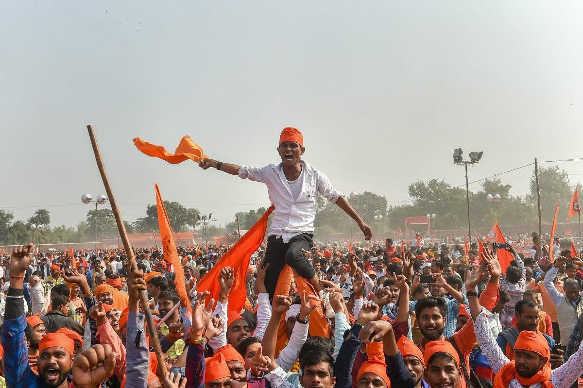 Supporters participate in `Dharam Sabha’, being organised by the Vishwa Hindu Parishad to push for the construction of the Ram temple, in Ayodhya, Sunday, Nov. 25, 2018. (PTI Photo)