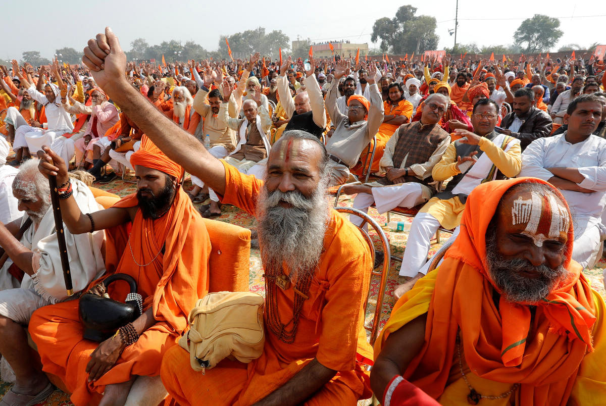 Sadhus or Hindu holymen shout slogans during "Dharma Sabha" or a religious congregation organised by the Vishva Hindu Parishad (VHP), a Hindu nationalist organisation, in Ayodhya, Uttar Pradesh, India, November 25, 2018. REUTERS/Pawan Kumar