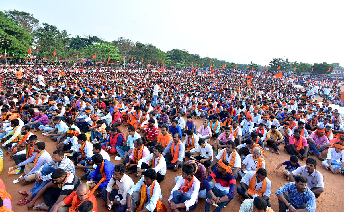 People take part in Janagraha Convetion held at Nahru Maidan in Mangaluru on Sunday.