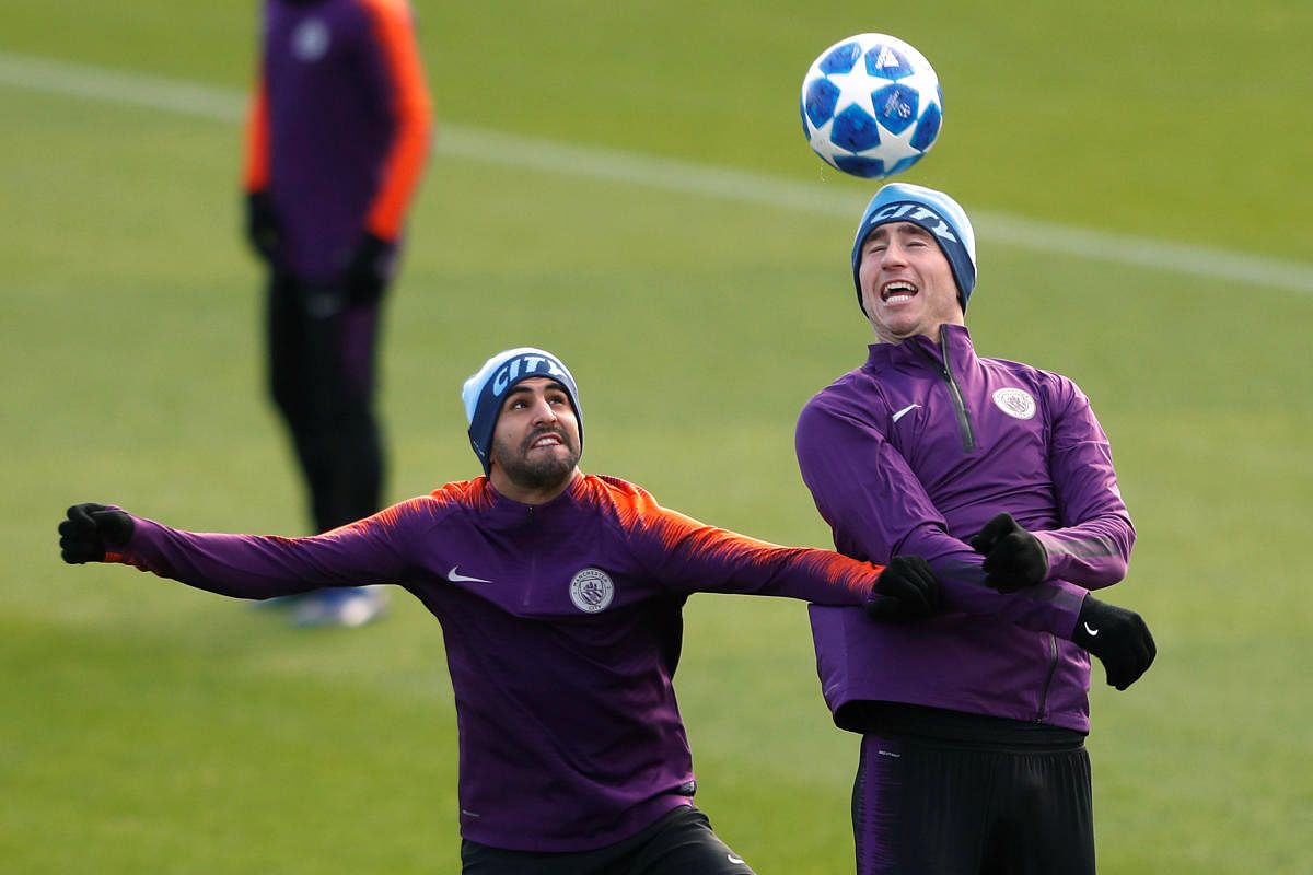Manchester City's Riyad Mahrez (left) and Aymeric Laporte during a training session ahead of their clash against Lyon on Wednesday. Reuters