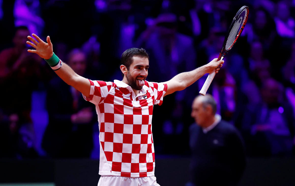 KINGS AGAIN Croatia’s Marin Cilic celebrates after defeating France’s Lucas Pouille on Sunday. REUTERS 