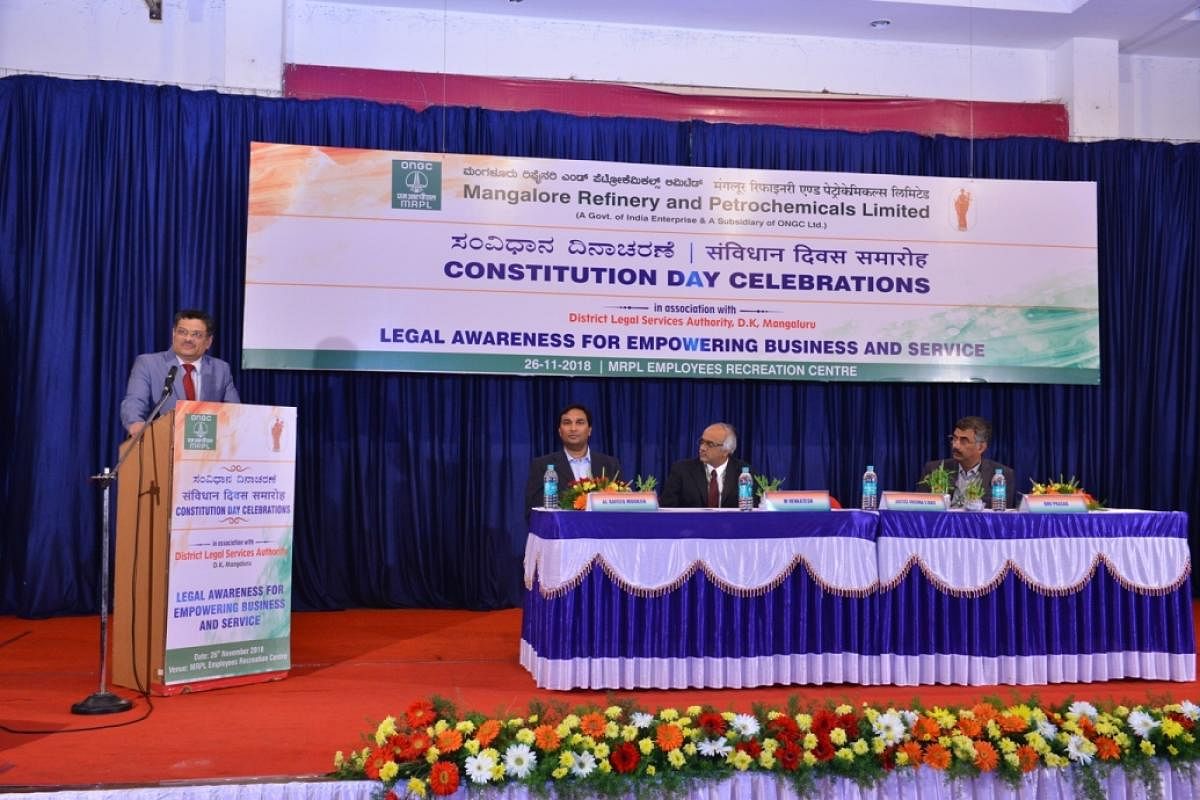 Karnataka High Court Judge Justice Krishna Shripad Dixit speaks at the Constitution Day programme organised by MRPL. MRPL Managing Director M Venkatesh, Group General Manager (HR) BHV Prasad and GM (Law) AL Rafeeq Moideen look on.