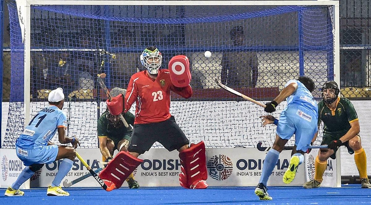 Bhubaneswar: India's Mandeep Singh (in blue) attempts a goal during their match against South Africa for Men's Hockey World Cup 2018, in Bhubaneswar, Wednesday, Nov. 28, 2018. (PTI Photo/Ashok Bhaumik) (PTI11_28_2018_000226B)