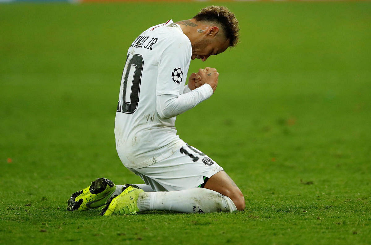 Paris St Germain's Neymar celebrates at the end of the match against Liverpool. (Reuters Photo)