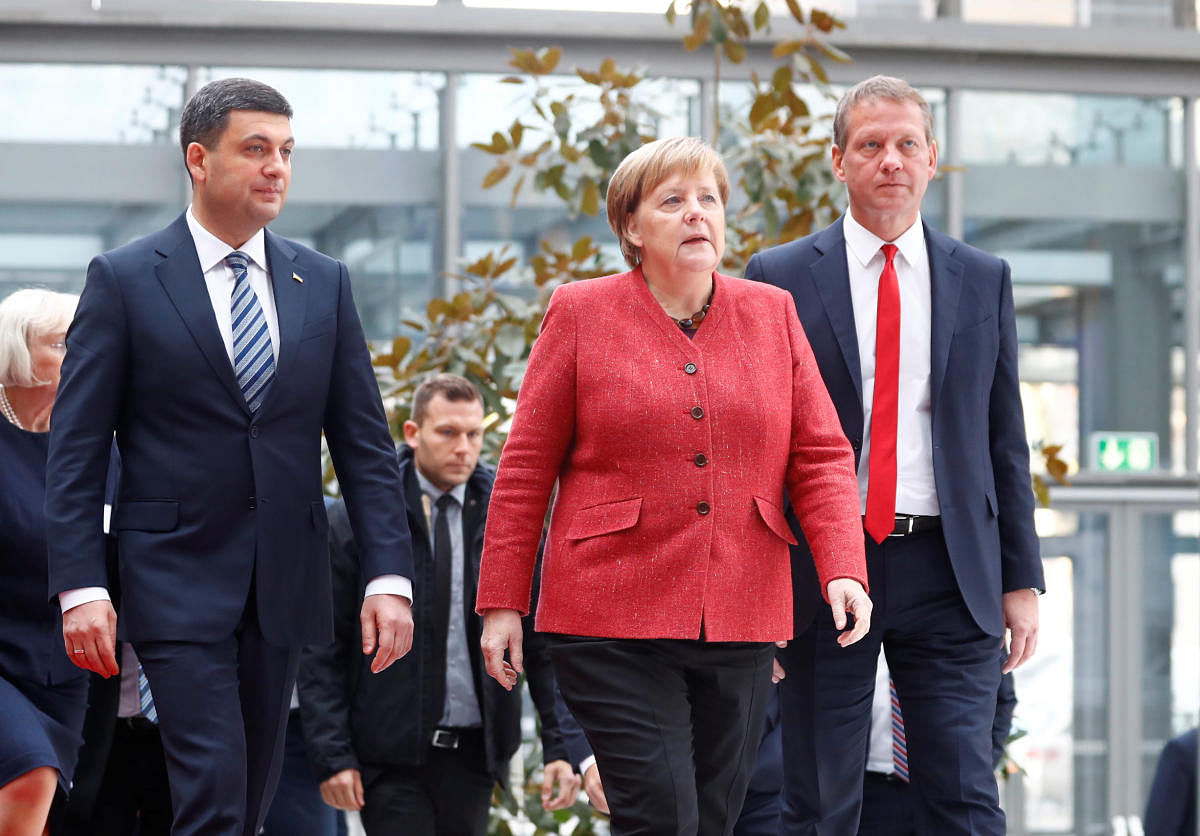 Ukrainian Prime Minister Volodymyr Groysman and German Chancellor Angela Merkel at the German-Ukrainian Business Forum conference in Berlin on November 29, 2018. Reuters