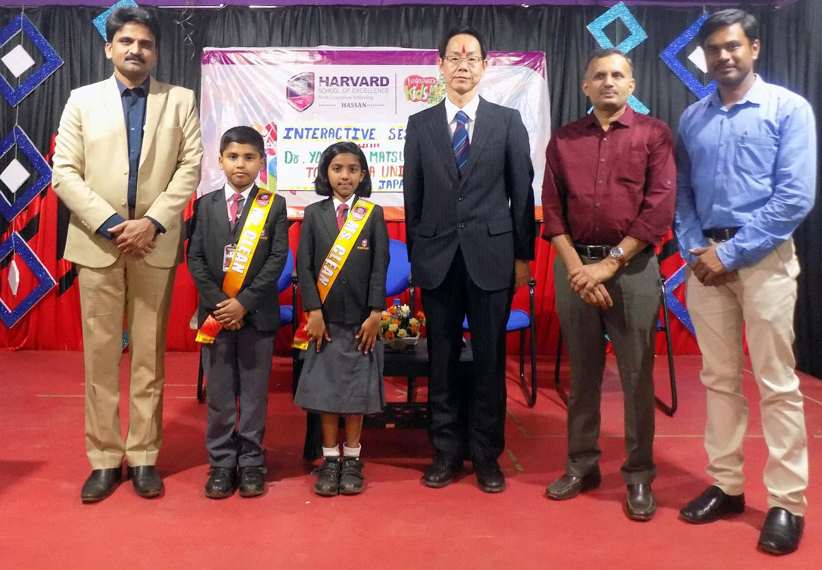 Dr Yoshizo Matsuka, Tokushima University, Japan, seen with the students and faculty of Harvard School of Excellence, in Hassan.