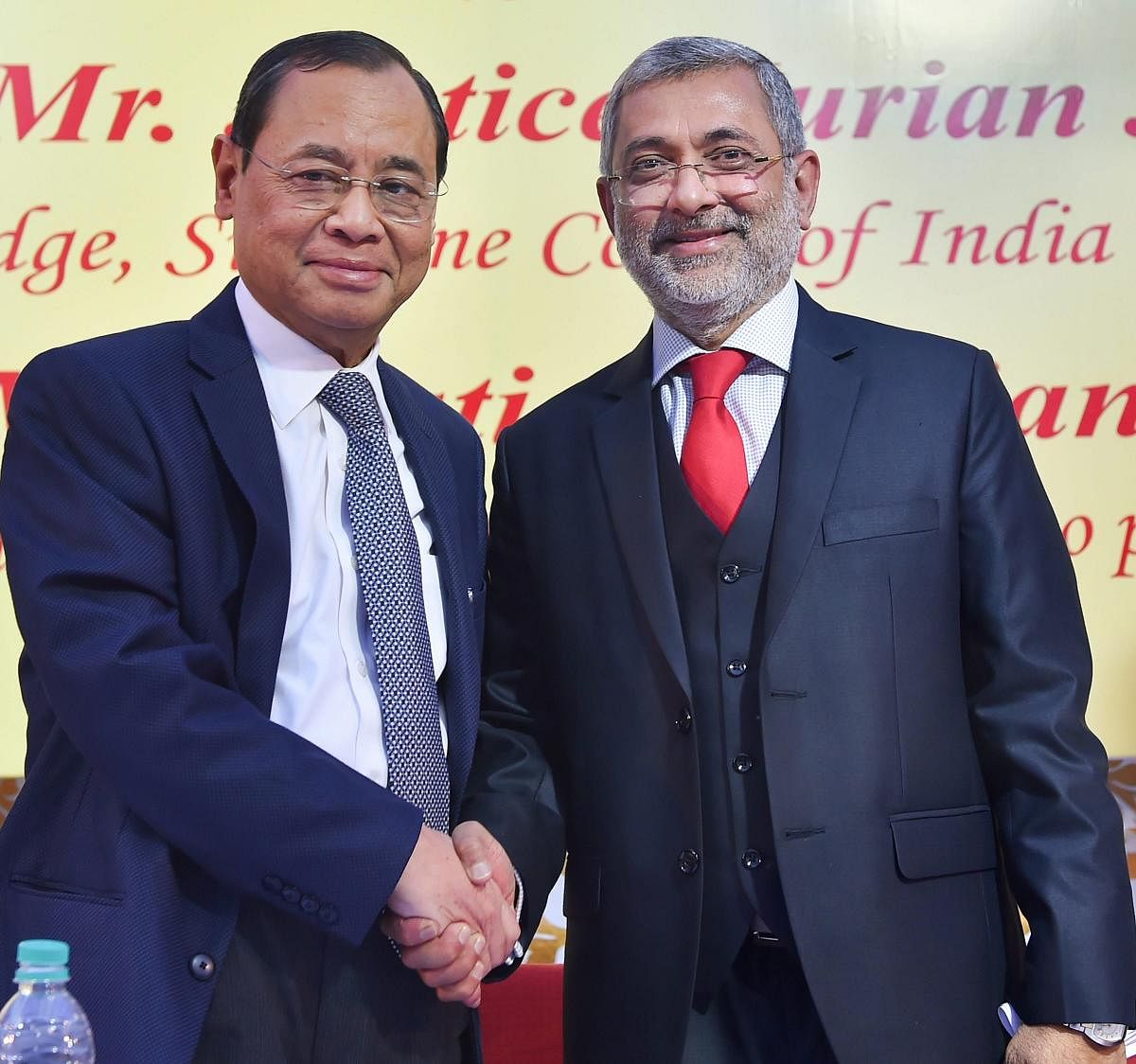 Chief Justice of India Justice Ranjan Gogoi (L) shakes hands with Justice Kurian Joseph during the latter's farewell function at the Supreme Court, in New Delhi, on Thursday. PTI