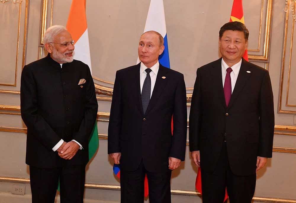 Modi, Putin and Jinping at the G20 summit. Photo: Twitter/narendramodi