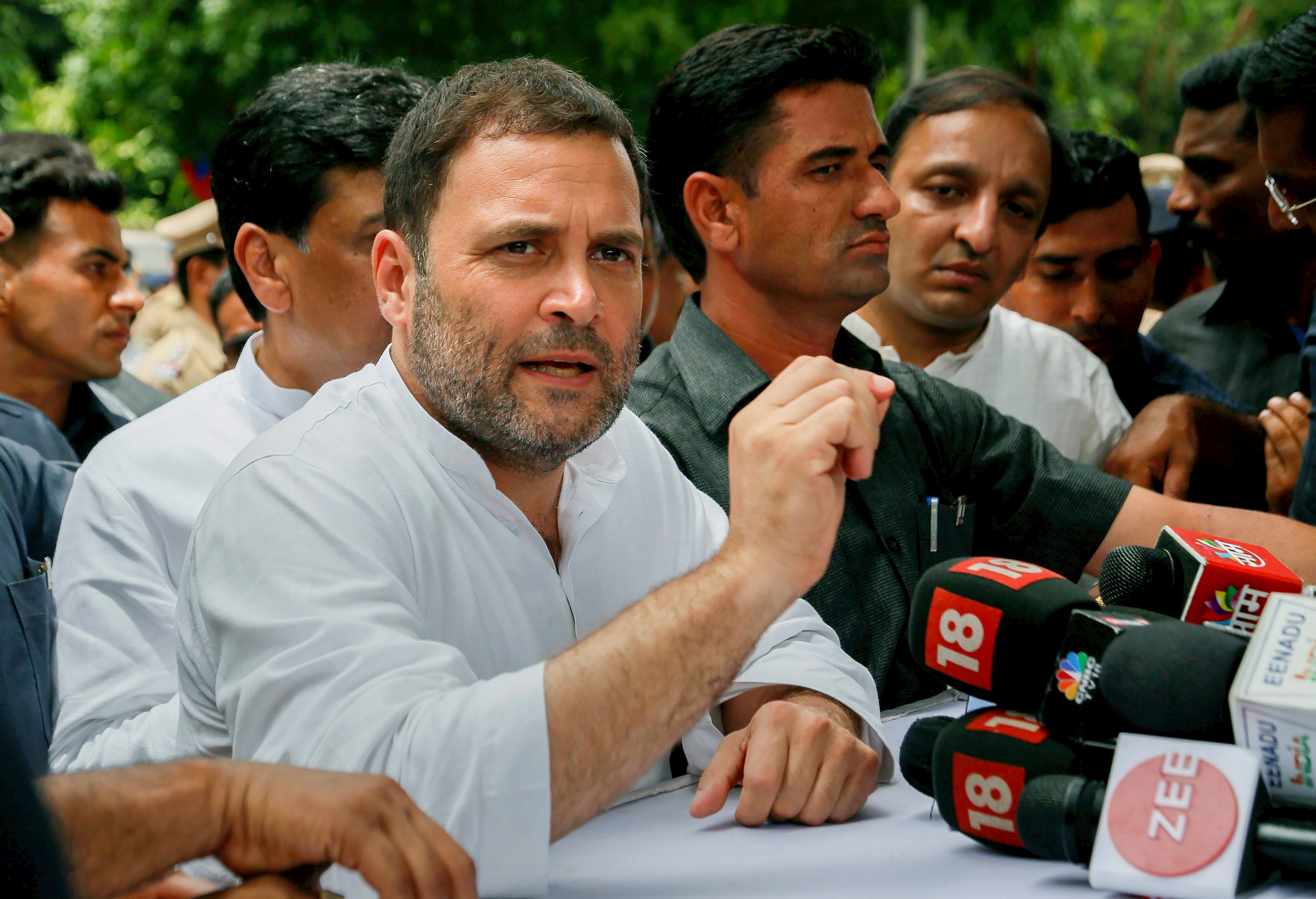 Congress President Rahul Gandhi addresses the media personnel outside a court at Bhiwandi, in Thane on Tuesday. PTI