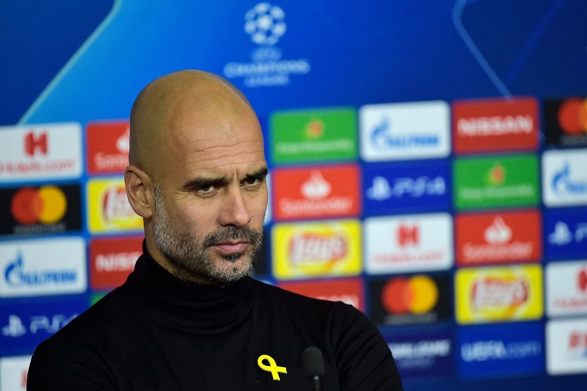 Pep Guardiola says FIFA proposals designed to limit the number of players allowed to be loaned out to rival clubs will seriously alter Manchester City's business model. AFP Photo
