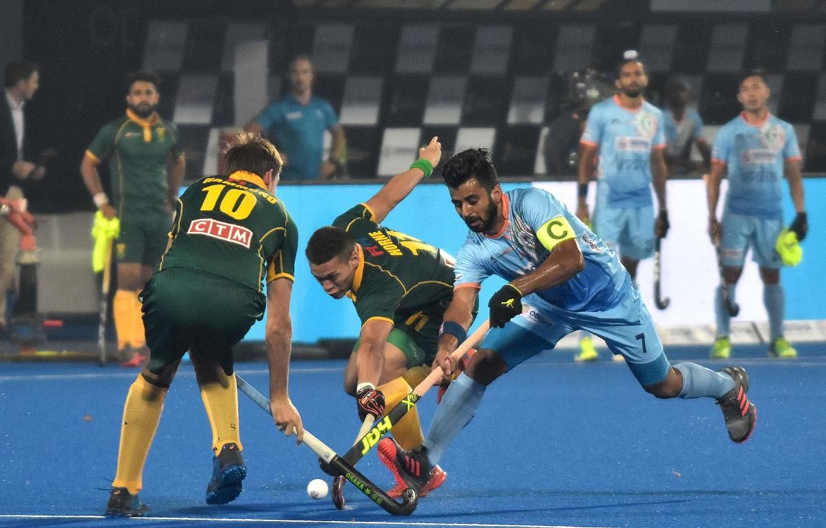 ALL SET: Indian skipper Manpreet Singh (right) will look to lead from the front against Belgium in their Pool C encounter in Bhubaneswar on Sunday. AFP File Photo