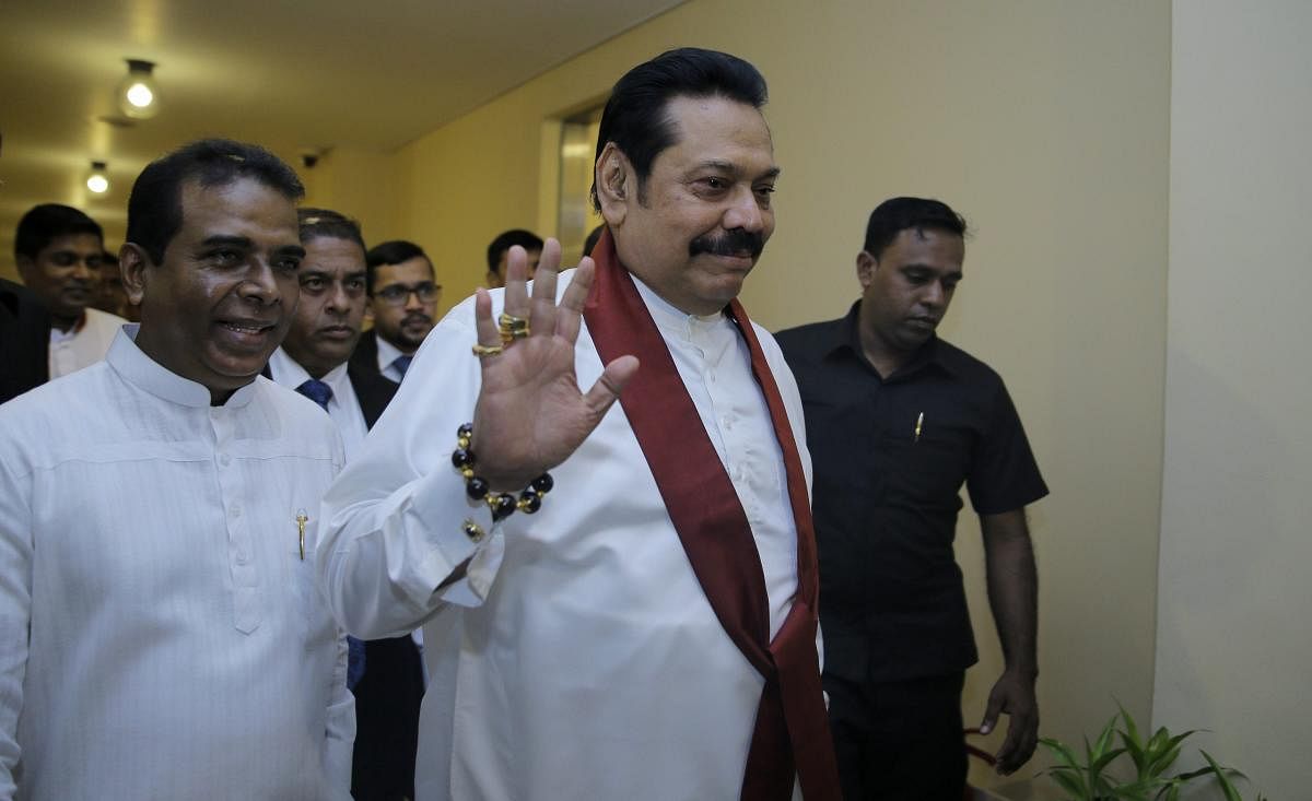 Failing to prove his majority twice, controversially appointed Sri Lankan Prime Minister Mahinda Rajapaksa on Sunday demanded to hold a snap parliamentary polls to end the ongoing political crisis in the country. PTI file photo