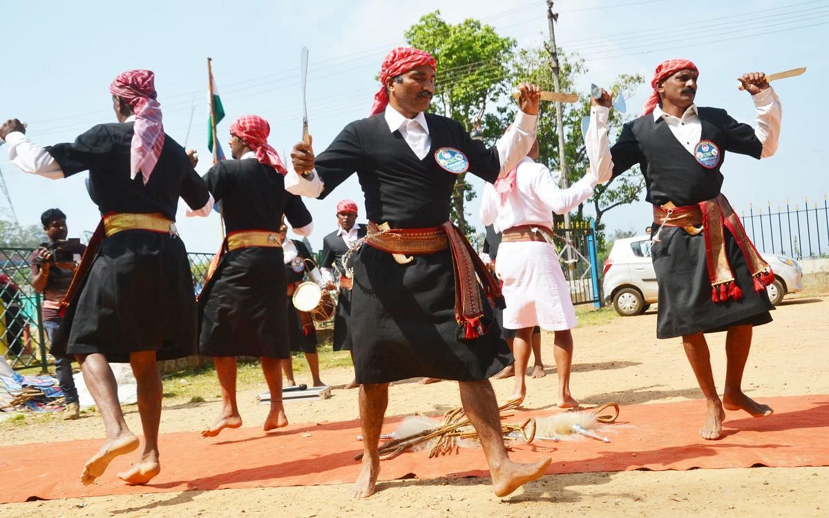 Kodavas take part in a programme as a part of the Kodava National Day observed by the Codava National Council in Madikeri on Sunday.