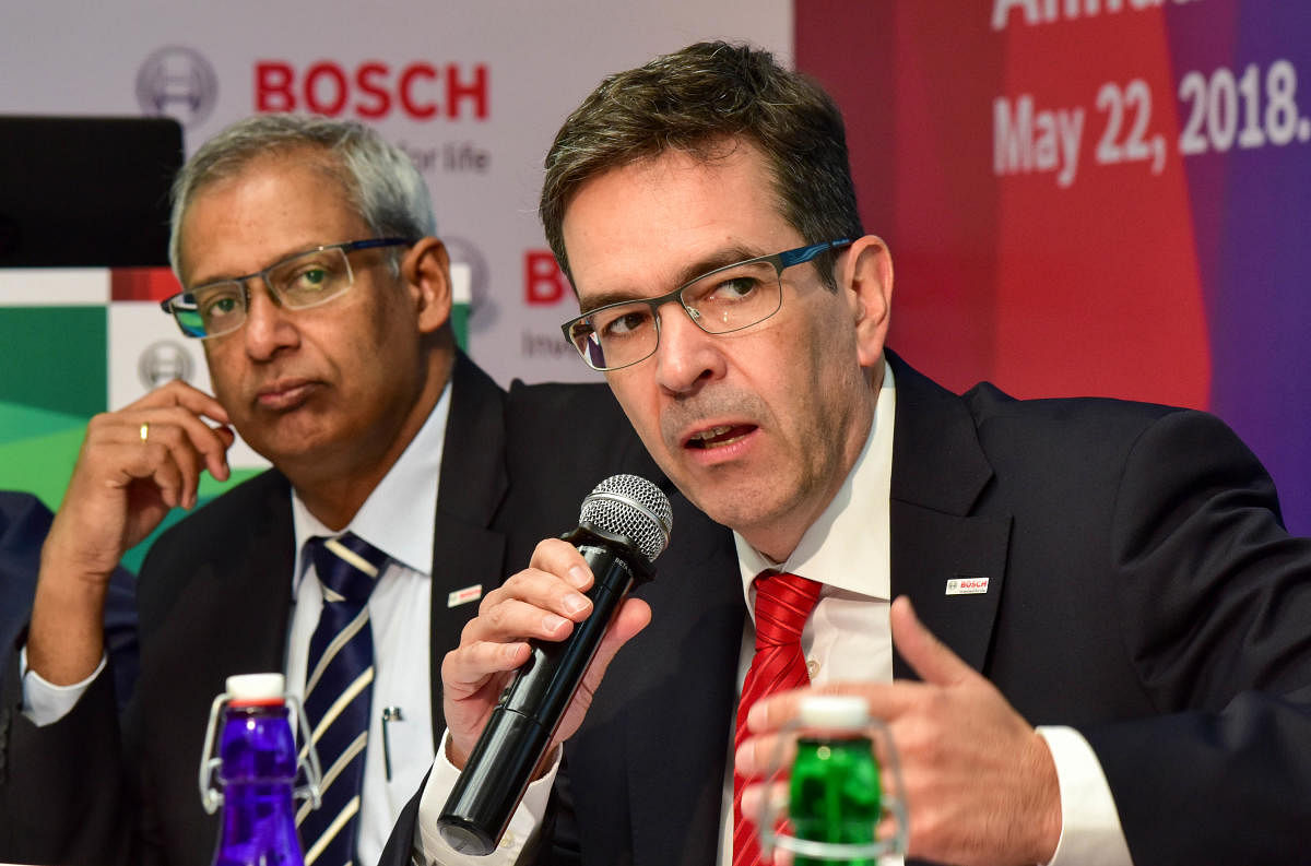 Soumitra Bhattacharya, Managing Director, Bosch Limited (left) and Jan O Rohrl, Chief Technology Officer &amp; Director, Bosch Limited, at the press conference in Bengaluru on Tuesday. DH Photo