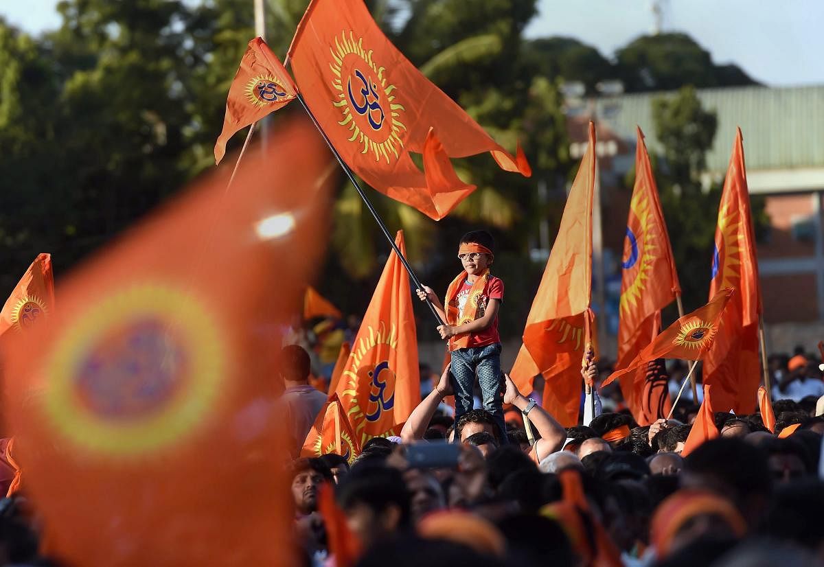 VHP activists during a procession in prior to their 'Janagraha Rally', organised to push for the construction of the Ram Temple in Ayodhya, in Bengaluru. (PTI Photo)