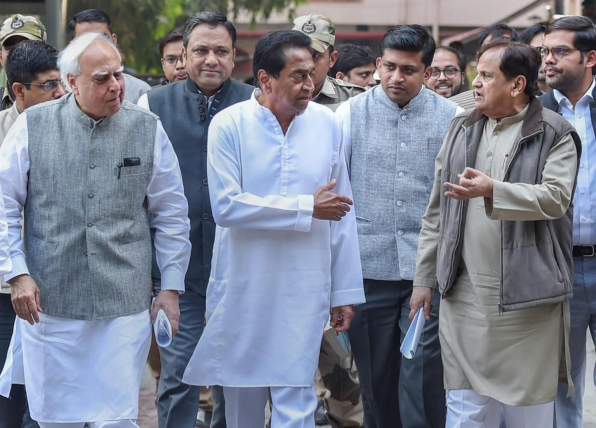 Congress leaders (L-R) Kapil Sibal, Kamal Nath, Ahmed Patel, and others leave after a meeting with the Election Commissioner at Nirvachan Sadan, in New Delhi, on Tuesday. PTI
