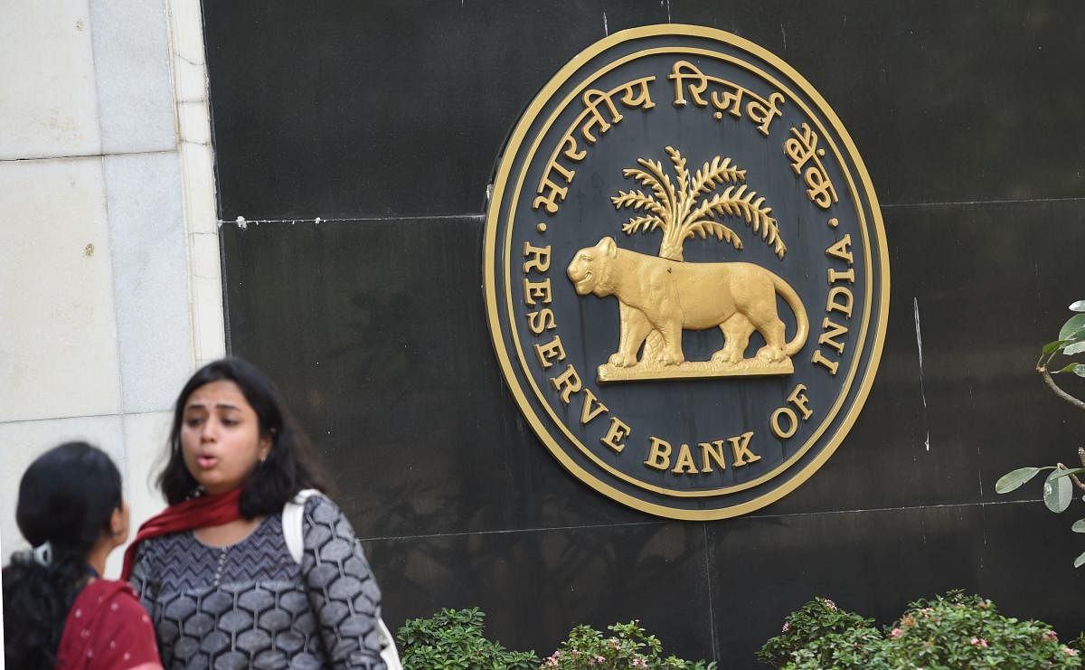 The RBI said it would reduce SLR by 25 basis points every quarter starting next month till it reached 18%. AFP Photo