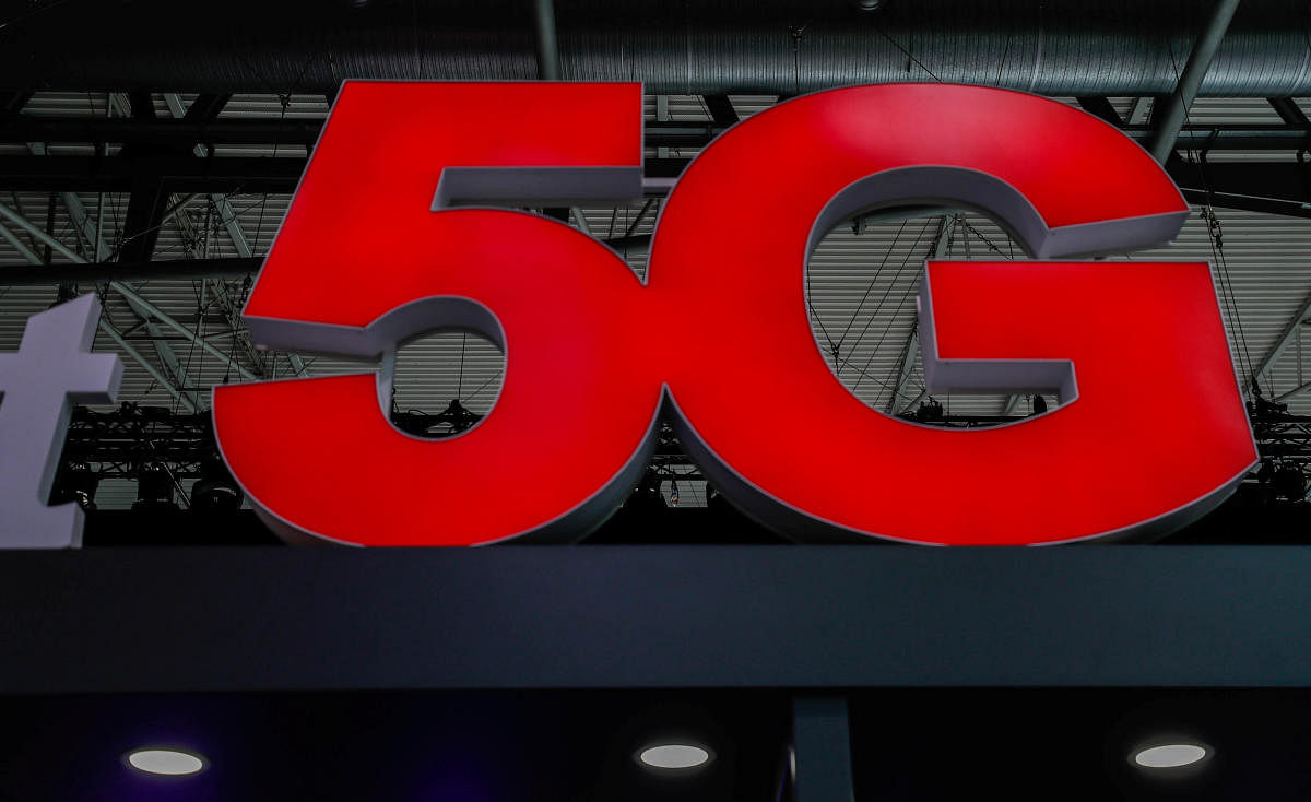 A 5G sign is seen during the Mobile World Congress in Barcelona, Spain February 28, 2018. REUTERS