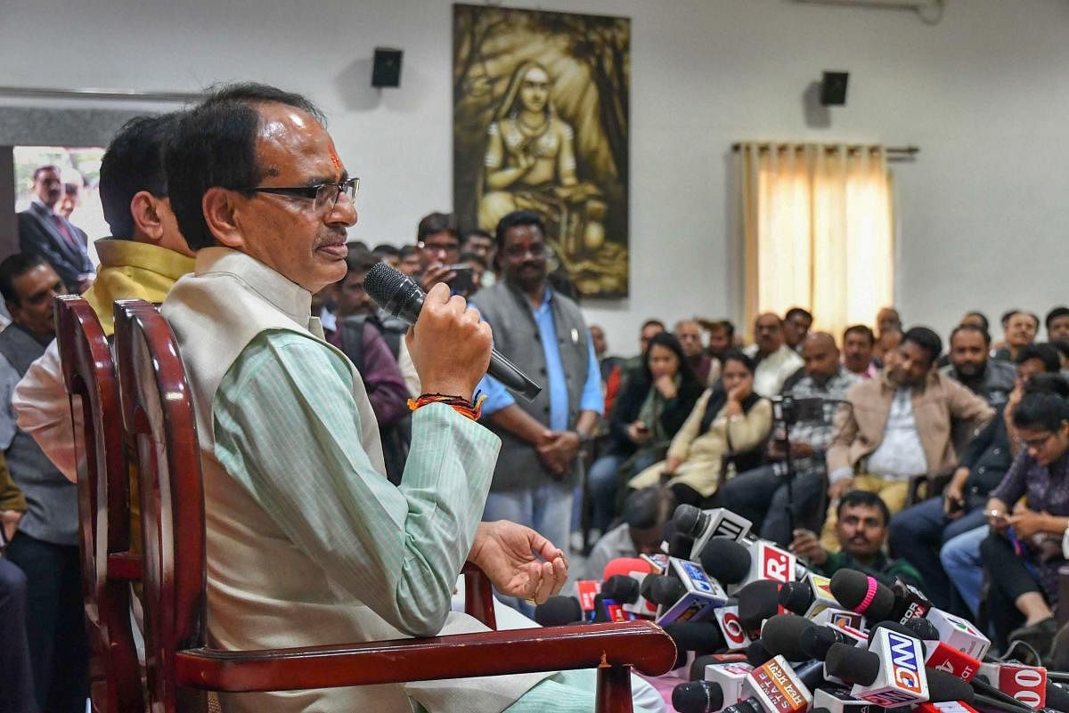 Madhya Pradesh Chief Minister Shivraj Singh Chouhan addresses a press conference at his residence, in Bhopal, on Wednesday. PTI