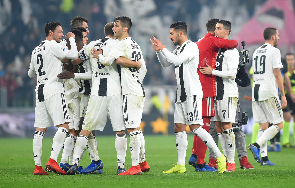 Juventus' Cristiano Ronaldo and teammates celebrate after the match against Inter Milan (REUTERS)