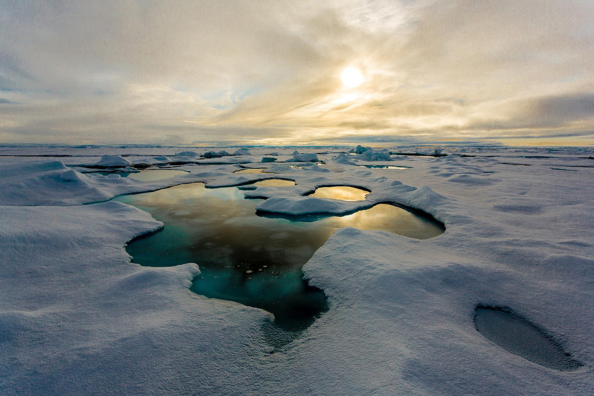 This handout image from April 24, 2018 shows melt ponds on the Arctic sea ice in the Central Arctic. AFP PHOTO / NATURE PUBLISHING / ALFRED WEGENER INSTITUT