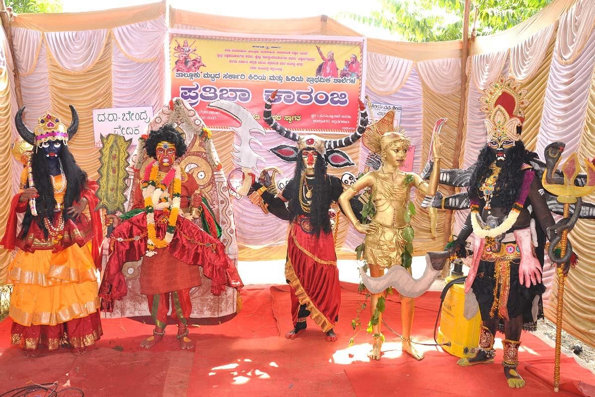 Students take part in a fancy dress competition organised as a part of Prathibha Karanji competitions at the Government Kannada Higher Primary School at Adishaktinagara Layoutin Chikkamagaluru on Saturday.