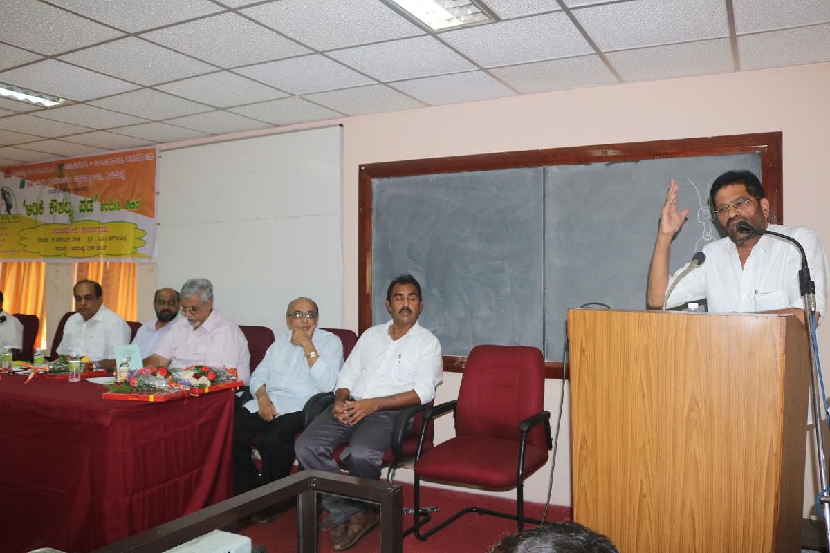 SCDCC Bank chairman M N Rajendra Kumar speaks at the valedictory of the training for arecanut tree climbers — Adike Kaushalya Pade—organised jointly by Campco, ICAR-CPCRI and the University of Agricultural and Horticultural Sciences, Shivamogga, at CPCRI regional station at Vittal on Sunday.