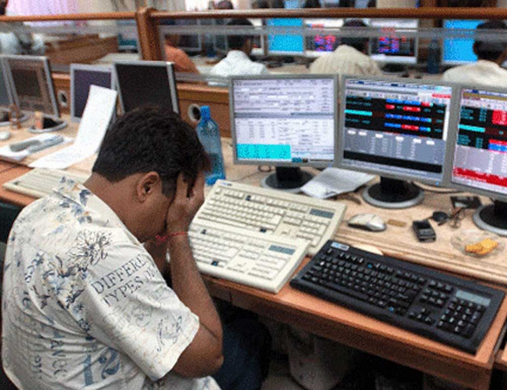 The BSE Sensex cracked below the 35,000 mark, plunging 713.53 points, or 2 percent, to close at 34,959.72.  Similarly, the broader NSE Nifty fell 205.25 points, or 1.92 percent, to 10,488.45. (PTI File Photo)