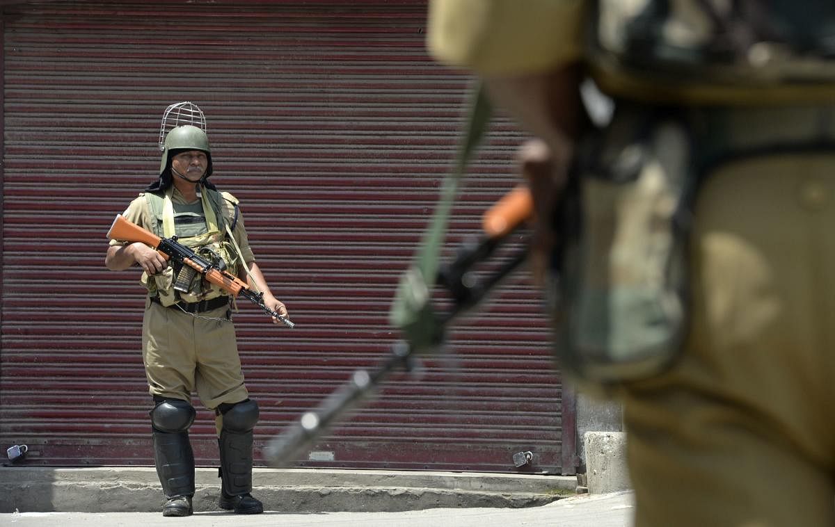 The incident took place at Zainpora when the terrorists entered into a guard room where four police personnel were present, they said. AFP File Photo 