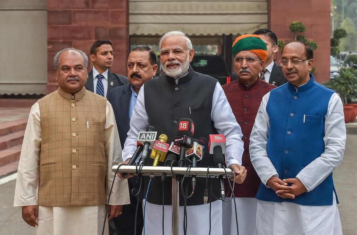Prime Minister Narendra Modi congratulated the Congress for its victory in assembly polls Tuesday and said the BJP, which has suffered reverses in the elections, accepts people's mandate with humility. PTI file photo