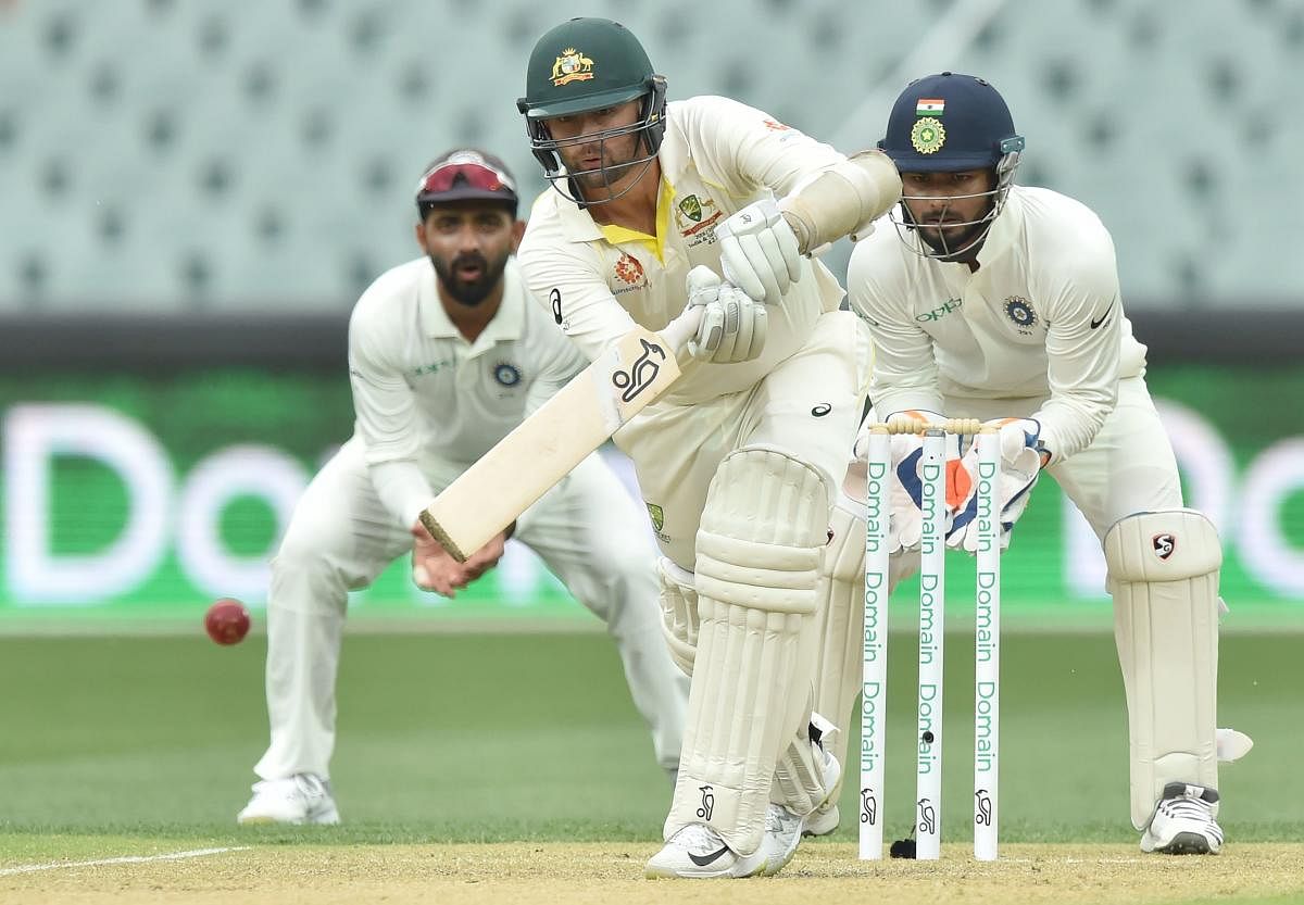 INSPIRING: Australian off-spinner Nathan Lyon showed great determination to slam an unbeaten 38 and almost take his side home in the first Test against India. AFP
