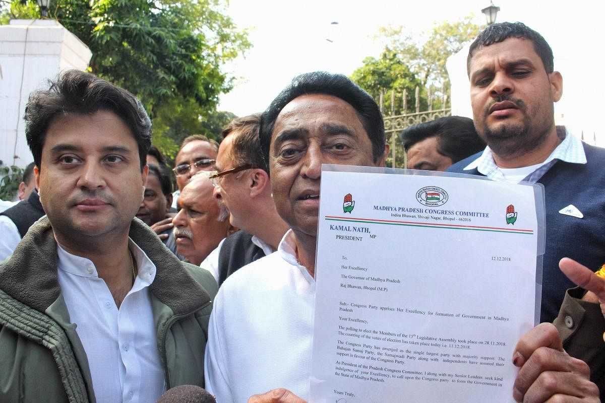 Madhya Pradesh Congress president Kamal Nath and party leader Jyotiraditya Scindia after meeting the governor to stake claim to form the government in Bhopal. PTI