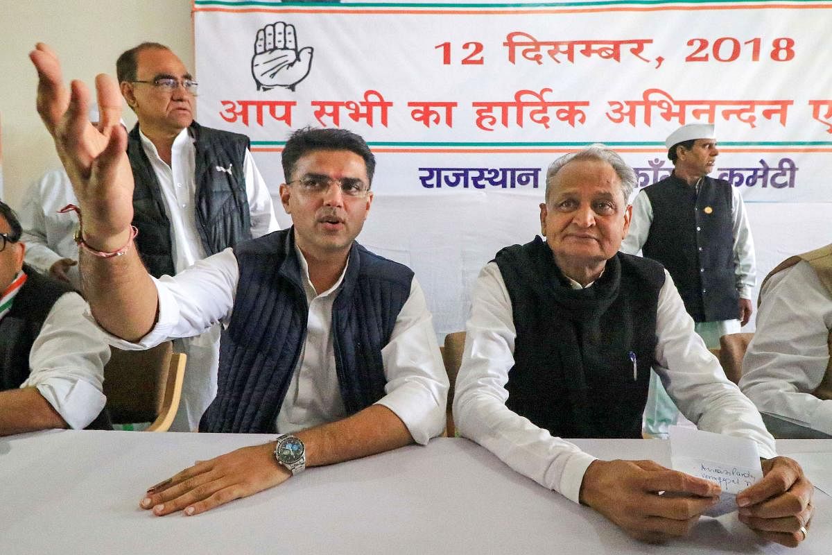 Congress leaders Sachin Pilot and senior leader Ashok Gehlot during a meeting with the newly elected MLA's at the party office, in Jaipur, Wednesday, Dec. 12, 2018. PTI 
